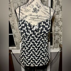 Daisy bustier with adjustable spaghetti straps.